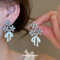 Crystal Flower Stud Earrings With Pastel Bow Drops view 3