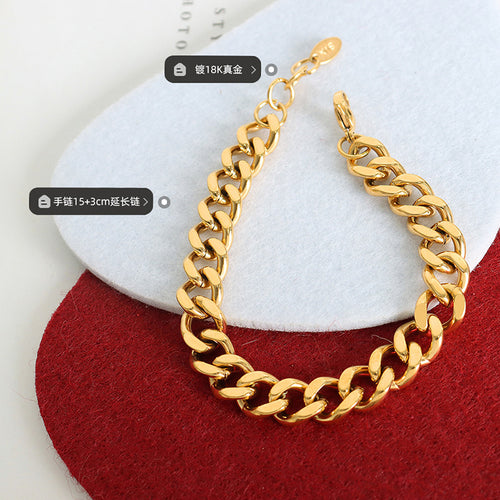 Gold curb bracelet flat lay with plating and length labels