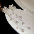 White Floral Pearl Tassel Drop Earrings With Decorative Details view 6