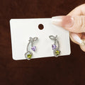 Silver Swirl Purple and Green Clear Look Stud Earrings view 3