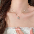 Butterfly and Pearl Station Necklace in Silver and Gold view 3