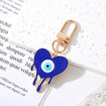 Gold and Silver Tone Melting Heart and Butterfly Eye Clip Keychains view 2