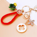 Mixed Floral Clover Leaf and Daisy Charm Keychains with Wrist Loops view 4