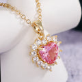 Gold Tone Pink Heart CZ Halo Pendant Necklace on Chain view 1