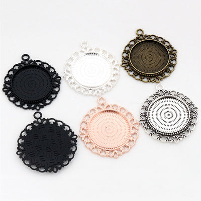 Image 1 showing round filigree edge pendant bezel settings in three finishes in the pictured colors and forms
