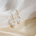 White Pearl Look Flower Cluster Gold Dangle Earrings view 2