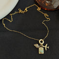 Passport Airplane and Shell Travel Charm Necklace in Gold Tone view 3
