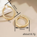 Textured Round Hoop Earrings in Gold-Tone Metal Jewelry view 4