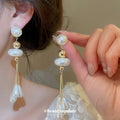 Gold Pearl Drop Earrings With Three White Teardrop Tassels view 2