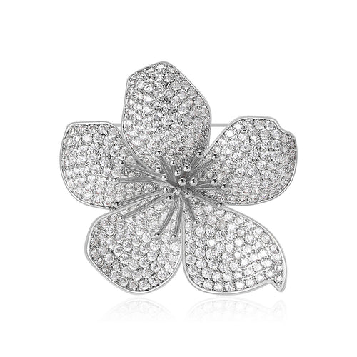 Front view of a rounded five-petal flower covered in clear pavé stones
