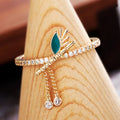 Gold Tone Green Leaf Open Ring With Chain Tassels With Polished Clear Stone Detail view 4