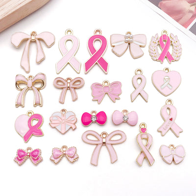 Colorful bow and butterfly charms arranged on a light background