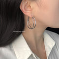 Twisted Double Band Large Hoop Earrings Silver and Gold view 2