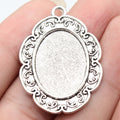 Scrollwork Oval 18 x 25 mm Pendant Setting in Silver Tone view 1