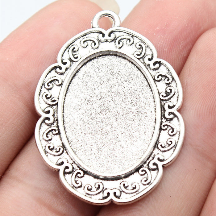 Scrollwork Oval 18 x 25 mm Pendant Setting in Silver Tone