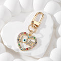 Gold Tone Rhinestone LOVE Heart Evil Eye Clip Keychains view 6