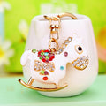 Mixed Rocking Horse Swan Peacock and Cross Keychains in Eight Designs view 2