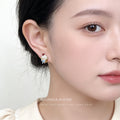 Gold Tone White Icing Red Fruit And Blue Bow Cupcake Stud Earrings view 2