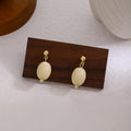 Cream Oval Bead Petite Drop and Dangle Stud Earrings view 3