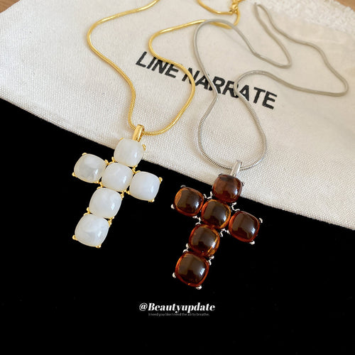 Long Resin Block Cross Pendant Necklace Two Colors arranged flat to show the full design