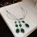 Silver Tone Green Triple Stone Drop Earrings With Clear Halos view 1