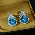 Silver Tone Blue Round Crystal Bow Stud Earrings Jewelry view 1