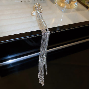 Single Silver Tone Crystal Fringe Clip On Earring with Polished Metal Accents