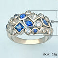 Blue Geometric Crystal Band Ring in Polished Metal view 5
