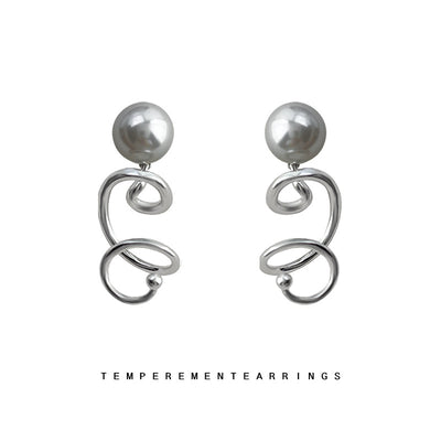 Gray glass pearl studs with silver spiral drops on white background