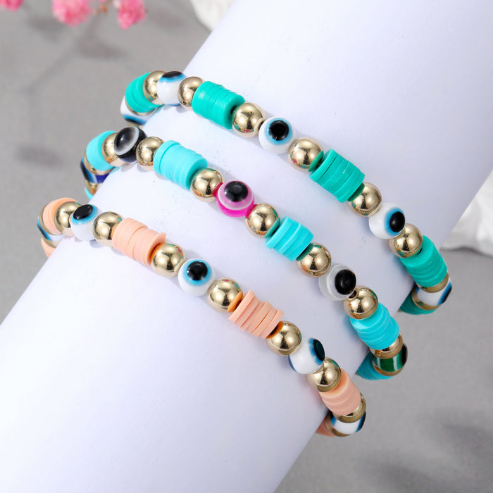 Gold Tone Evil Eye and Polymer Clay Bead Stretch Bracelets