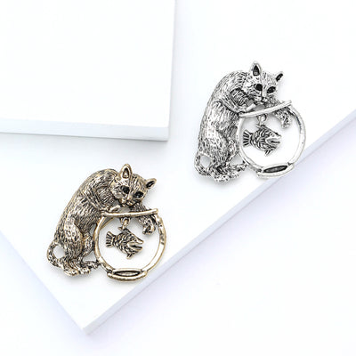 Cat Fishing Brooch shown alone on a light background