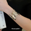 Openwork Butterfly Wing Wide Cuff Bracelet In Gold Or Silver Tone view 3