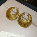 Woven Open Circle Huggie Earrings In Eight Designs view 8