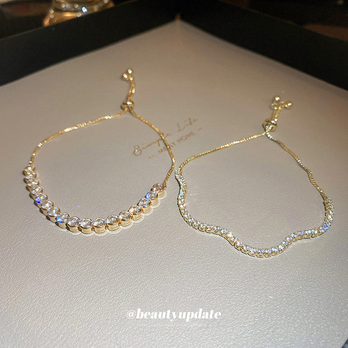 Gold Tone Adjustable Slider Bracelet In Round Or Wavy Crystal Rows