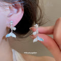 Mermaid Tail Pearl Drop Ear Clips in Gold and Silver view 3