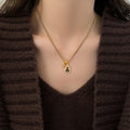 Gold Tone Gourd Pendant Necklace With Brown Stone Pendant Jewelry view 3