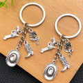 Antique Silver Cowboy Hat Boot and Pistol Keychain Set view 2
