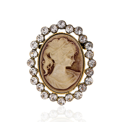 Front product view of the woman portrait brooch pin in gold and silver