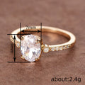Oval Clear Solitaire Three-Stone Ring In Polished Gold Tone view 4