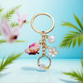 Pink Butterfly White Flower and Pearl-Look Wreath Keychain view 1