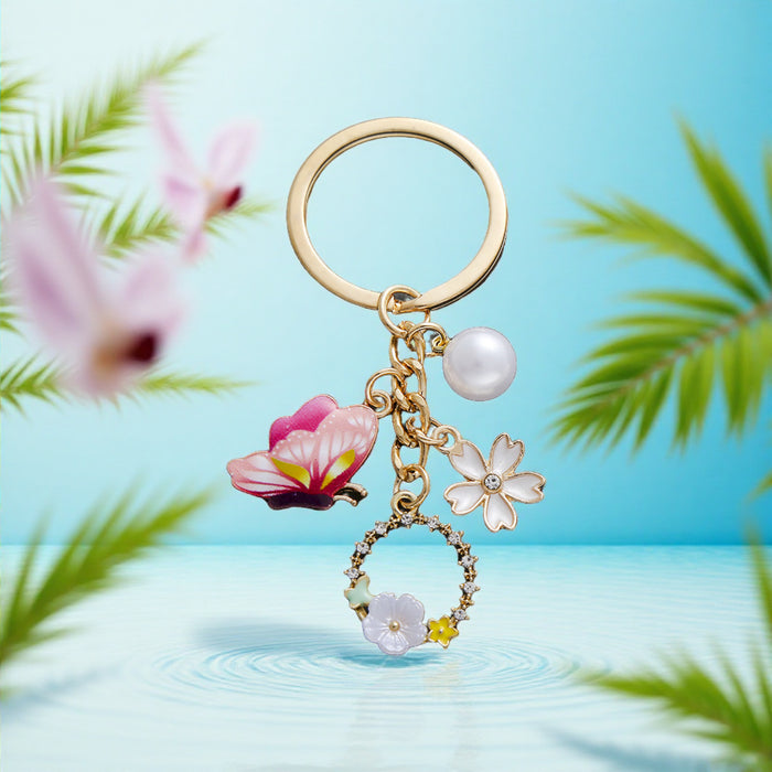 Pink Butterfly White Flower and Pearl-Look Wreath Keychain