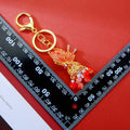 Illuminated Orange Plume Keychain With Pearl and Bead Tassels view 4