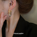 Two Tone Interlocking Oval Huggie Hoop Polished Metal Polished Metal Earrings view 3