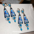 Blue Faceted Teardrop Floral Dangle Clip On Earrings view 1