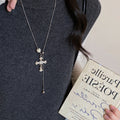 Cross Pendant Necklace with Crystal Drops in Gold and Silver Tones view 7