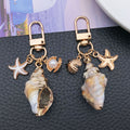 Four Gold Tone Shell Starfish and Pearl-Look Clasp Charms for Accessory Making view 3