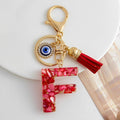 Red Resin Shell Letter Keychain with Evil Eye and Tassel view 10