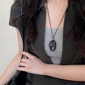 Oval Cutout Resin Pendant Long Cord Necklace in Two Colors view 6