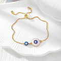 Gold Tone Blue Evil Eye Double-Dangle Slider Bracelets in Eight Designs view 5