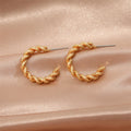 Textured Twist C-Shaped Hoop Earrings in Gold and Silver Tone view 4